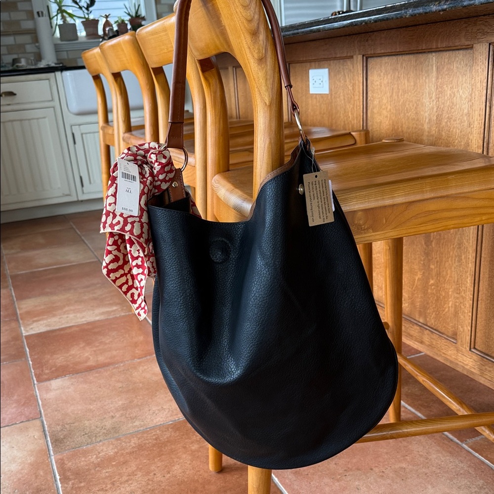 Anthropologie Black Hobo Bag with Red Scarf Accent